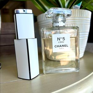 Chanel No 5 L’eau Eau De Toilette 3.4 oz with retractable 0.7 oz purse spray.